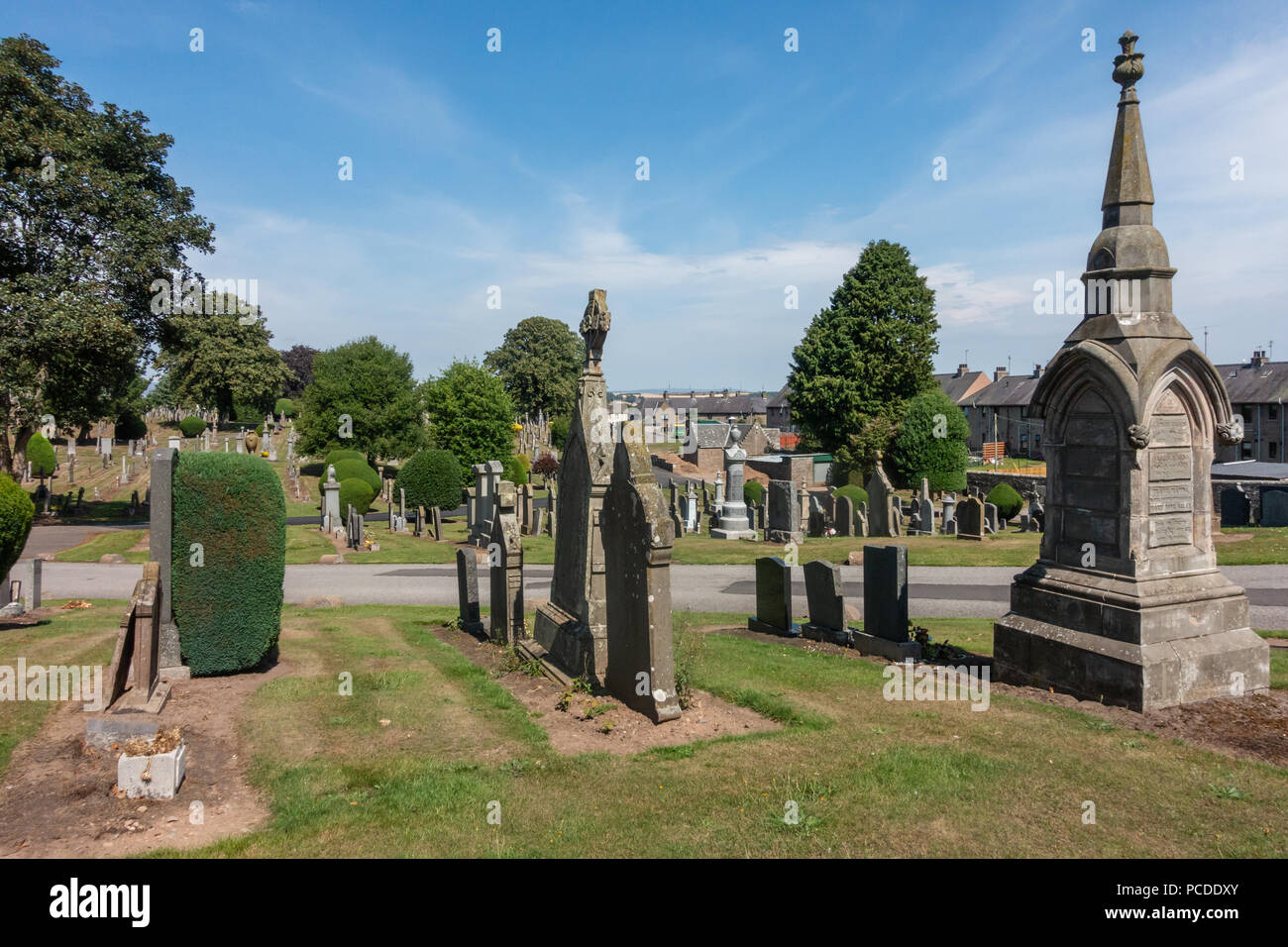 Graves in the cemetery at Kirriemuir in Scotland. A place to go an remember loved ones. Stock Photo