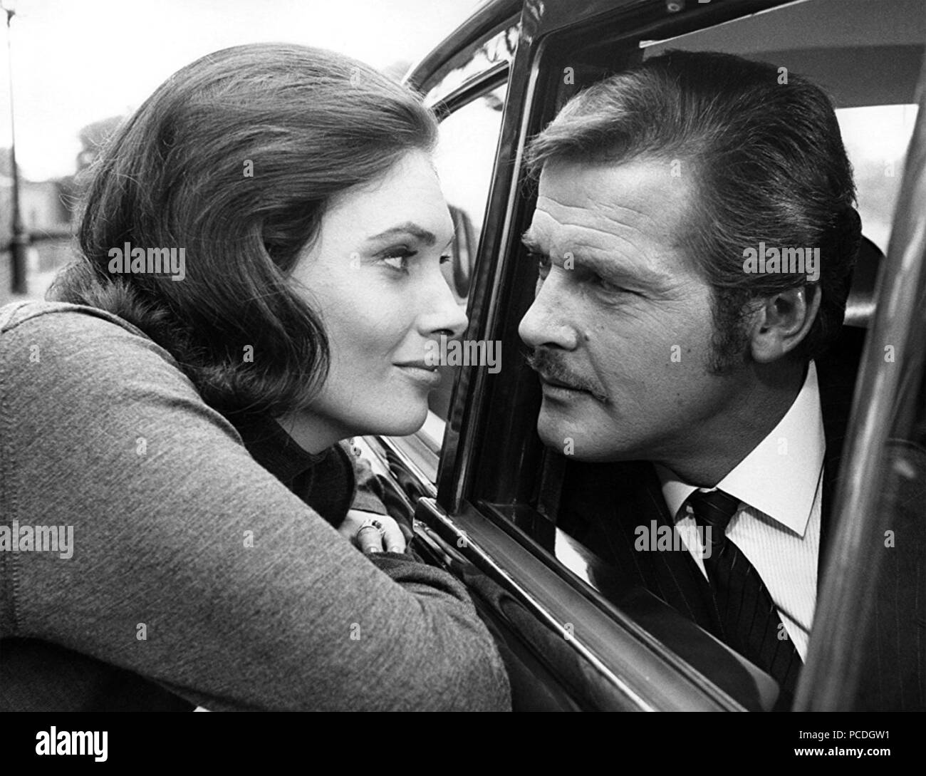 THE MAN WHO HAUNTED HIMSELF 1970 EMI Films production with Roger Moore and Hildegarde Neil Stock Photo
