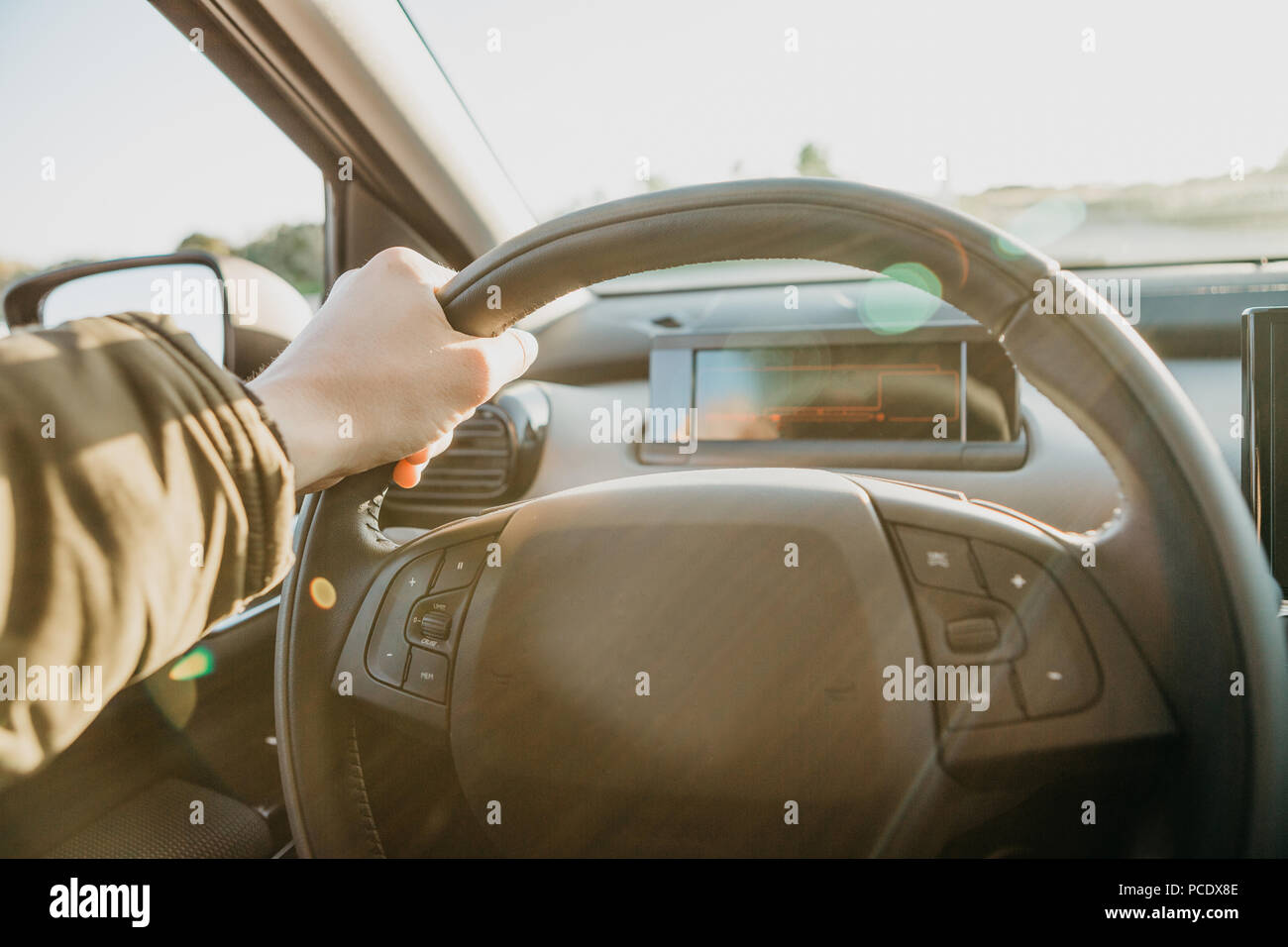 Drivers hand holding steering wheel hi-res stock photography and images ...
