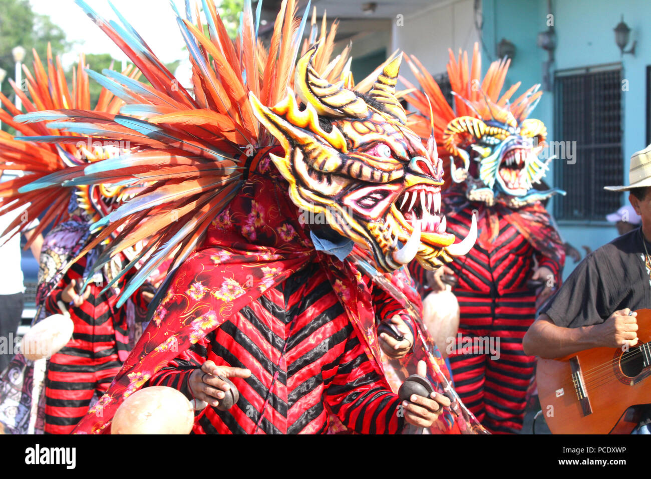 Diablicos or Devils dancing on the streets of Los Santos, Panama celebrating Corpus Christi Stock Photo
