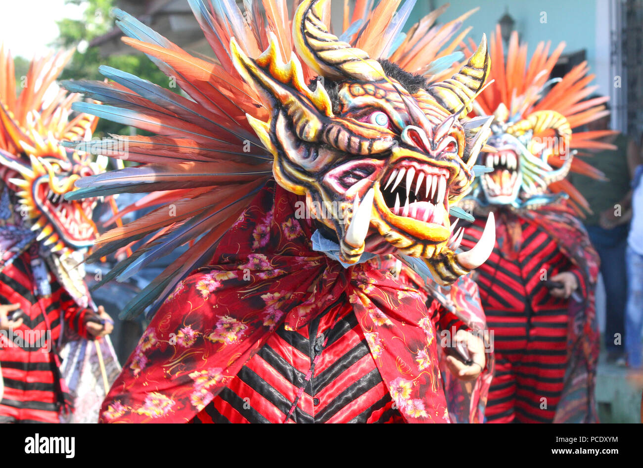 Diablicos or Devils dancing on the streets of Los Santos, Panama celebrating Corpus Christi Stock Photo