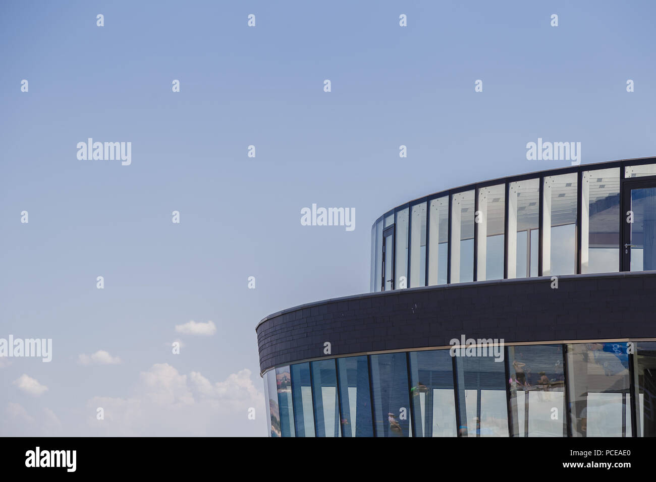 Modern building against the blue sky, modern design Stock Photo - Alamy