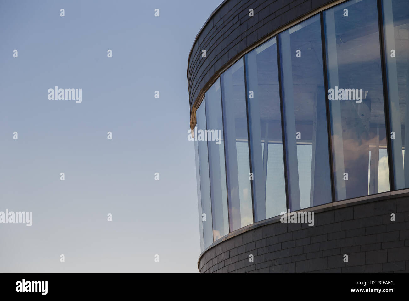 Modern building against the blue sky, modern design Stock Photo - Alamy