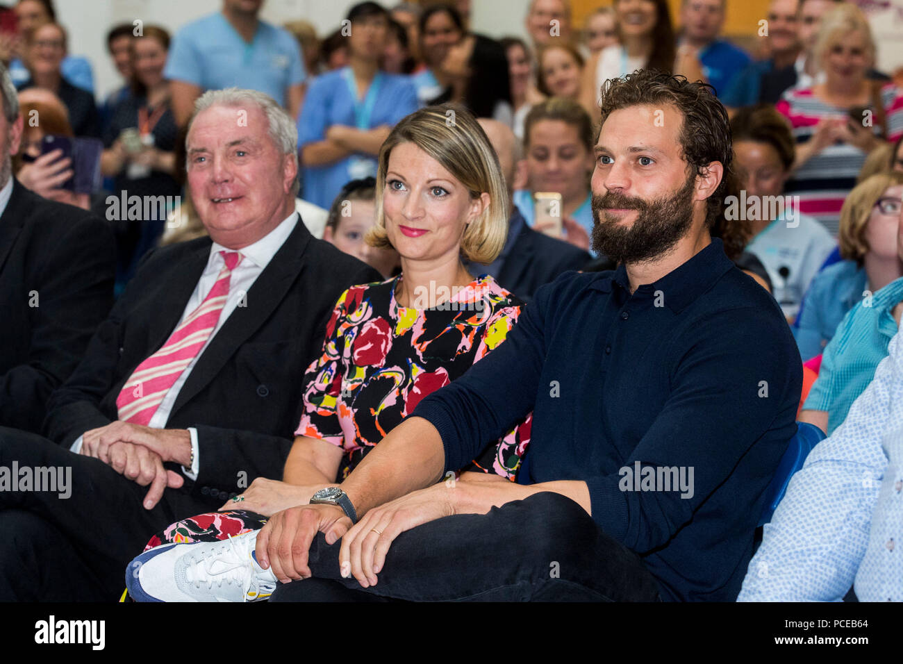 Northern Irish actor Jamie Dornan (right) with his sister Jessica Dornan Lynas and father Dr Jim Dornan, during the Pancreatic Cancer charity NIPanC launch at the Mater Hospital in Belfast. Stock Photo