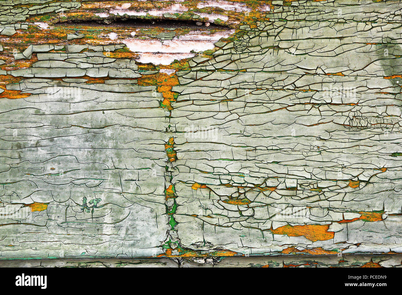 texture of cracked painted  surface on old wooden door Stock Photo