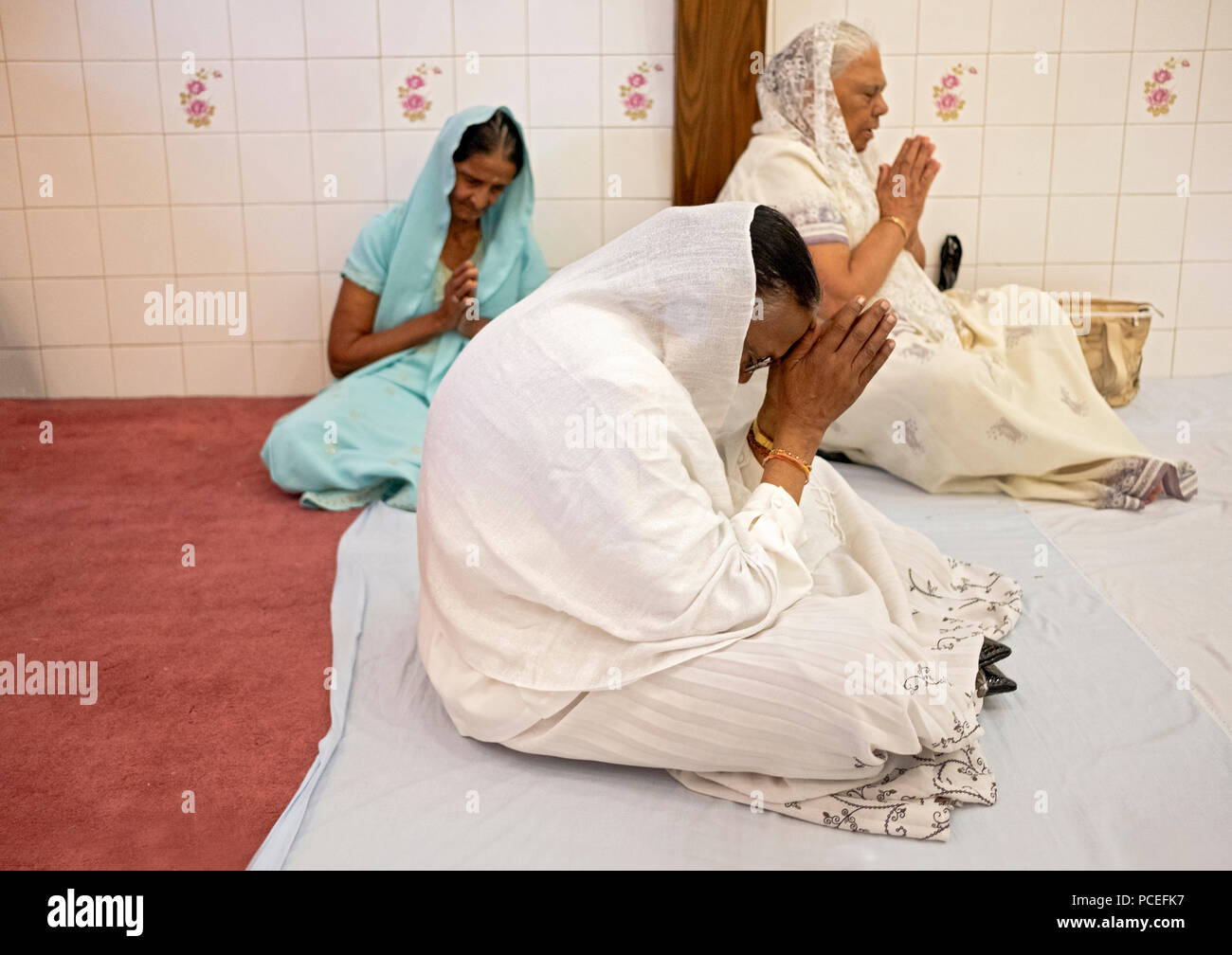 Three Women Praying Stock Photos Three Women Praying Stock