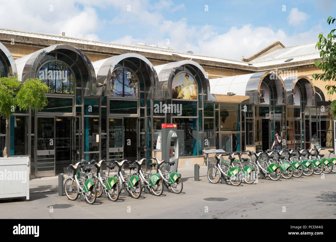 A row of rental bikes parked outside the railway station in Nancy, France, Europe Stock Photo