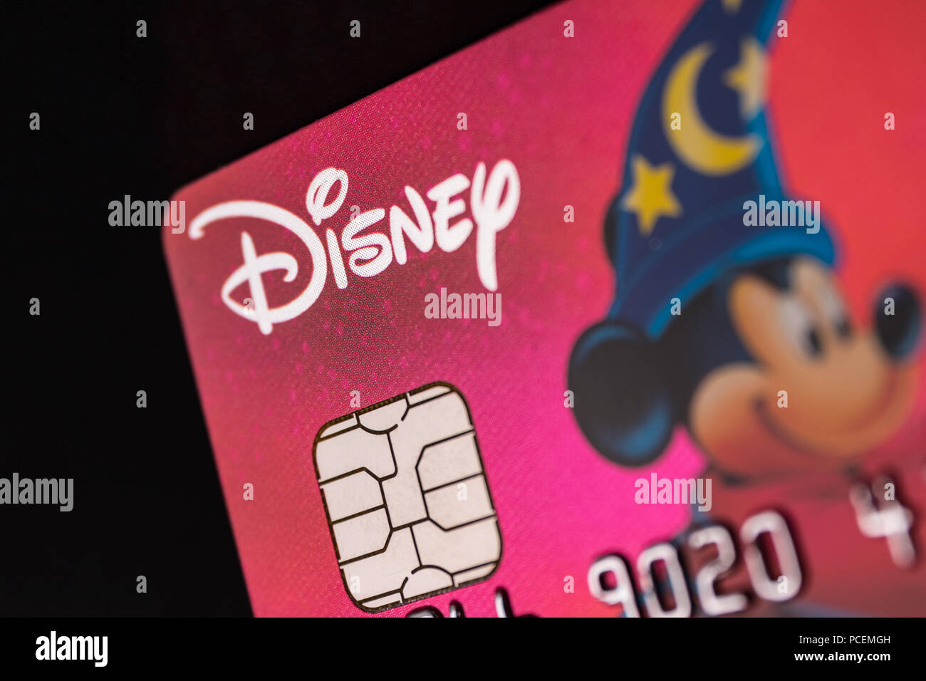 Indianapolis - Circa July 2018: Disney logo on a credit card. Disney is wrapping up the purchase of 21st Century Fox IV Stock Photo