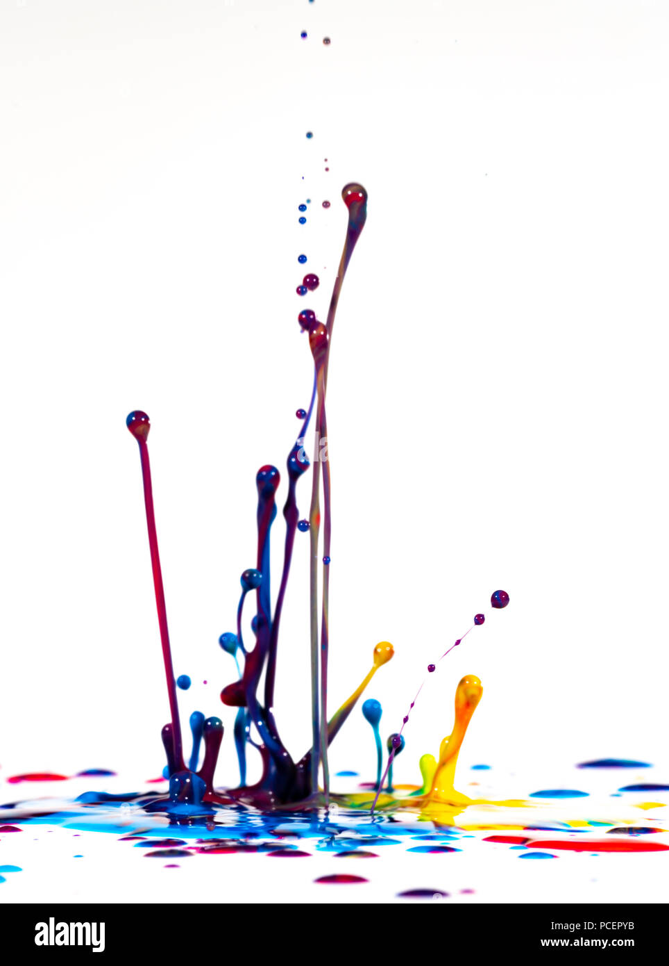 splash of color ink on white background Stock Photo - Alamy