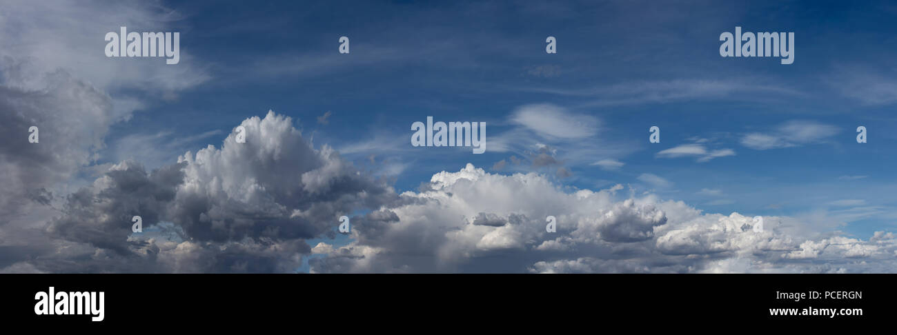 Beautiful blue sky with fluffy white clouds scattered across Stock ...