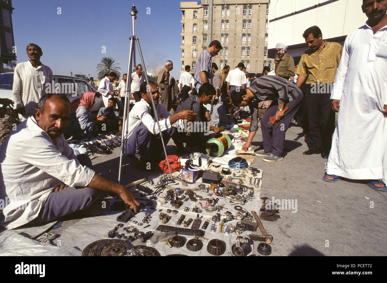 Baghdad, Iraq - October 1995 - Iraqi's of all classes go to the second hand public markets to find items and spare parts not found elsewhere due to the strict UN sanctions imposed during the 1990s because of Iraq's invasion of Kuwait in 1990. Stock Photo