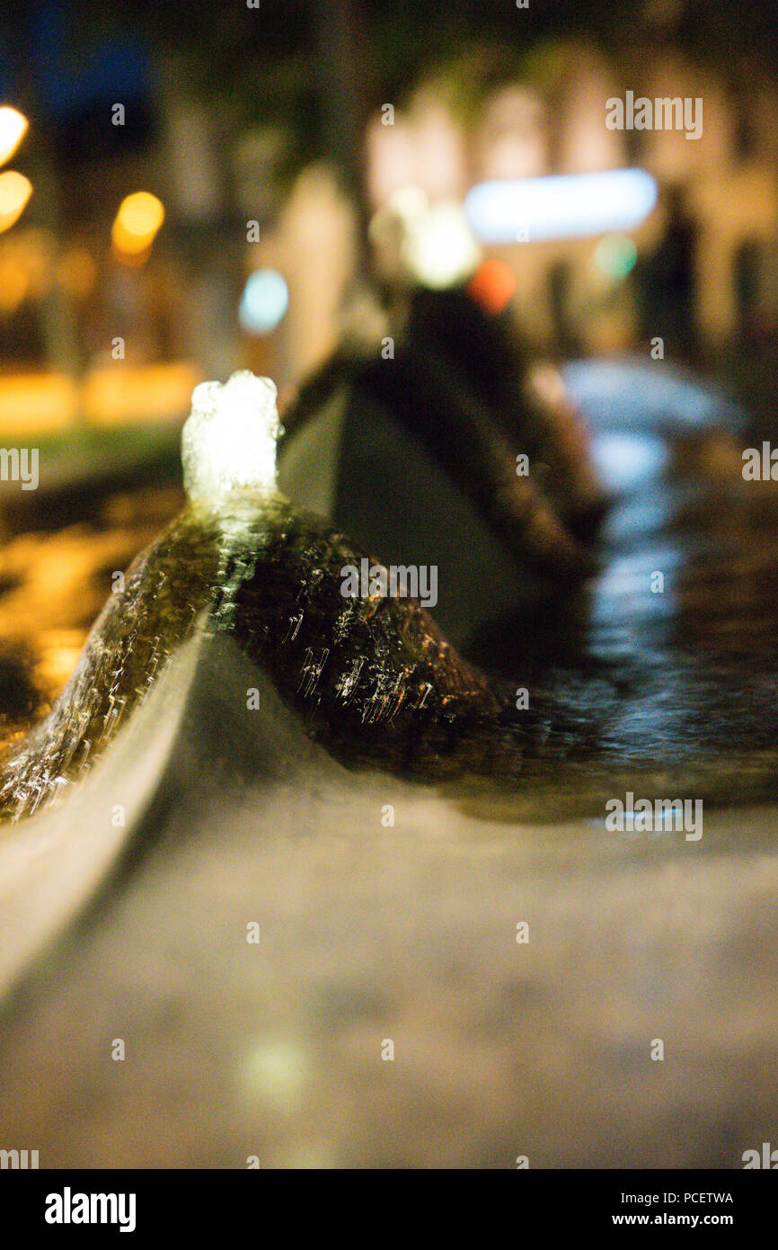 water fountain in the night close up picture Stock Photo - Alamy
