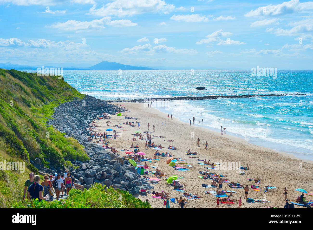 BIARRITZ, FRANCE - AUGUST 11, 2017: People at the Milady beach in a hot summer day. Biarritz famous summer vacation tourists destination. Stock Photo