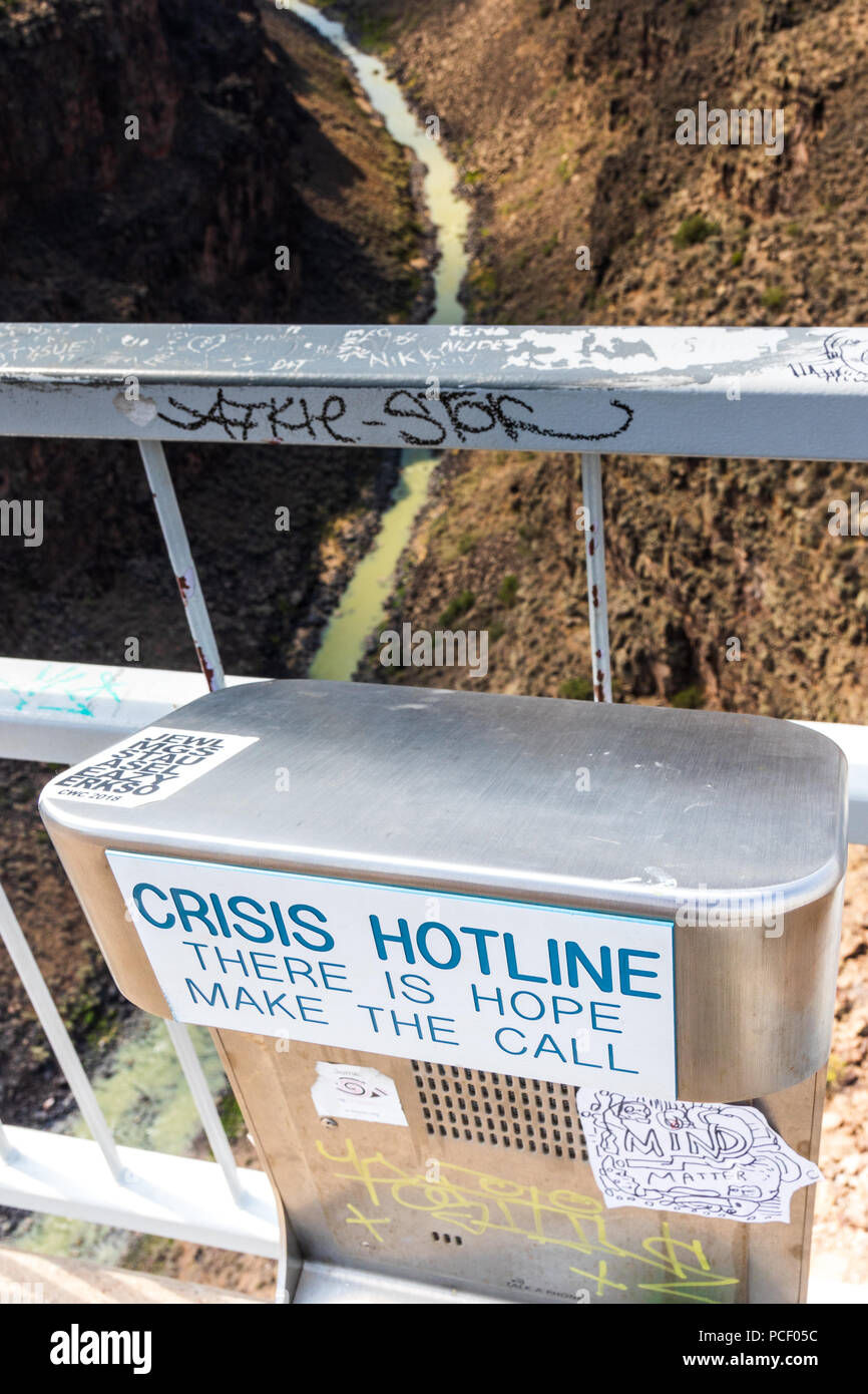 TAOS, NM, USA-6 JULY 18:  The Rio Grande Gorge Bridge, on US 64 south of Taos has, been the site of many suicides, hence the emergency call box shown. Stock Photo