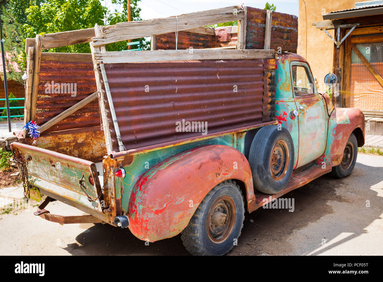 ARROYO SECO, NM, USA-12 JULY 18:  This colorful 1950ish Chevrolet pickup truck sets in a parking lot in the small village, with current license plates Stock Photo