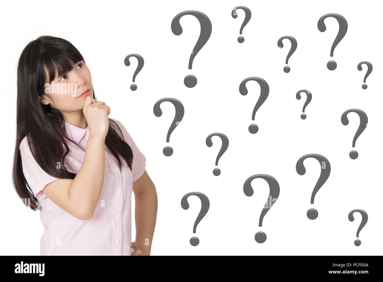 Portrait of a Beautiful Chinese American woman deep in thought with question marks isolated on a white background Stock Photo