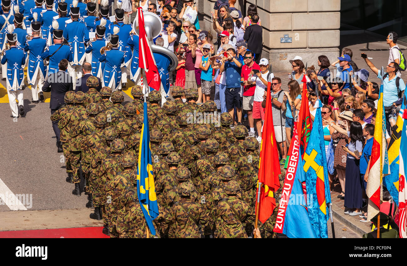 Zurich, Switzerland - August 1, 2018: participants of the parade devoted to the Swiss National Day passing along Uraniastrasse street. The Swiss Natio Stock Photo