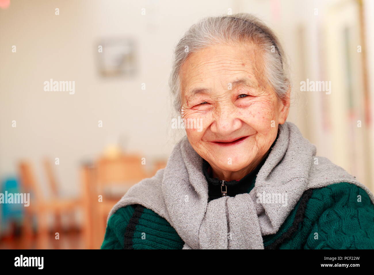 Happy senior asian woman potrait in home Stock Photo