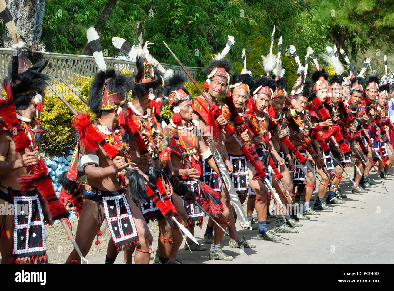 Naga tribal group performers standing in line to welcome the Officials ...