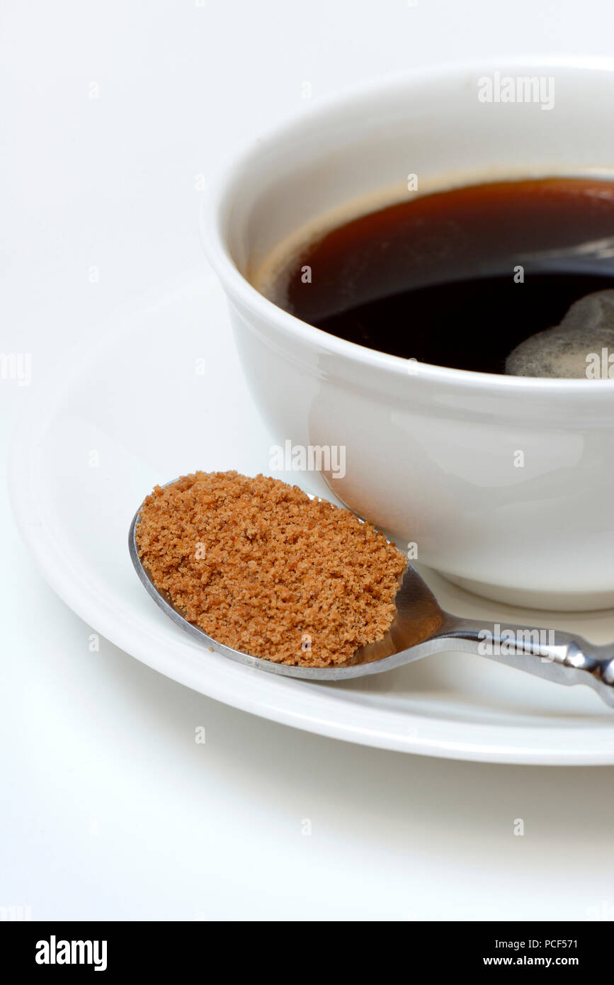 Loeffel mit Kokosbluetenzucker, Kaffeetasse mit Kaffee Stock Photo
