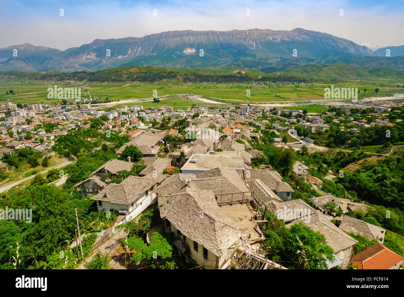 Cityscape with neighborhoods Old Bazaar and mountains, Drino Valley and Lunxhëria Mountain, Gjirokastra, Gjirokastër, Albania Stock Photo
