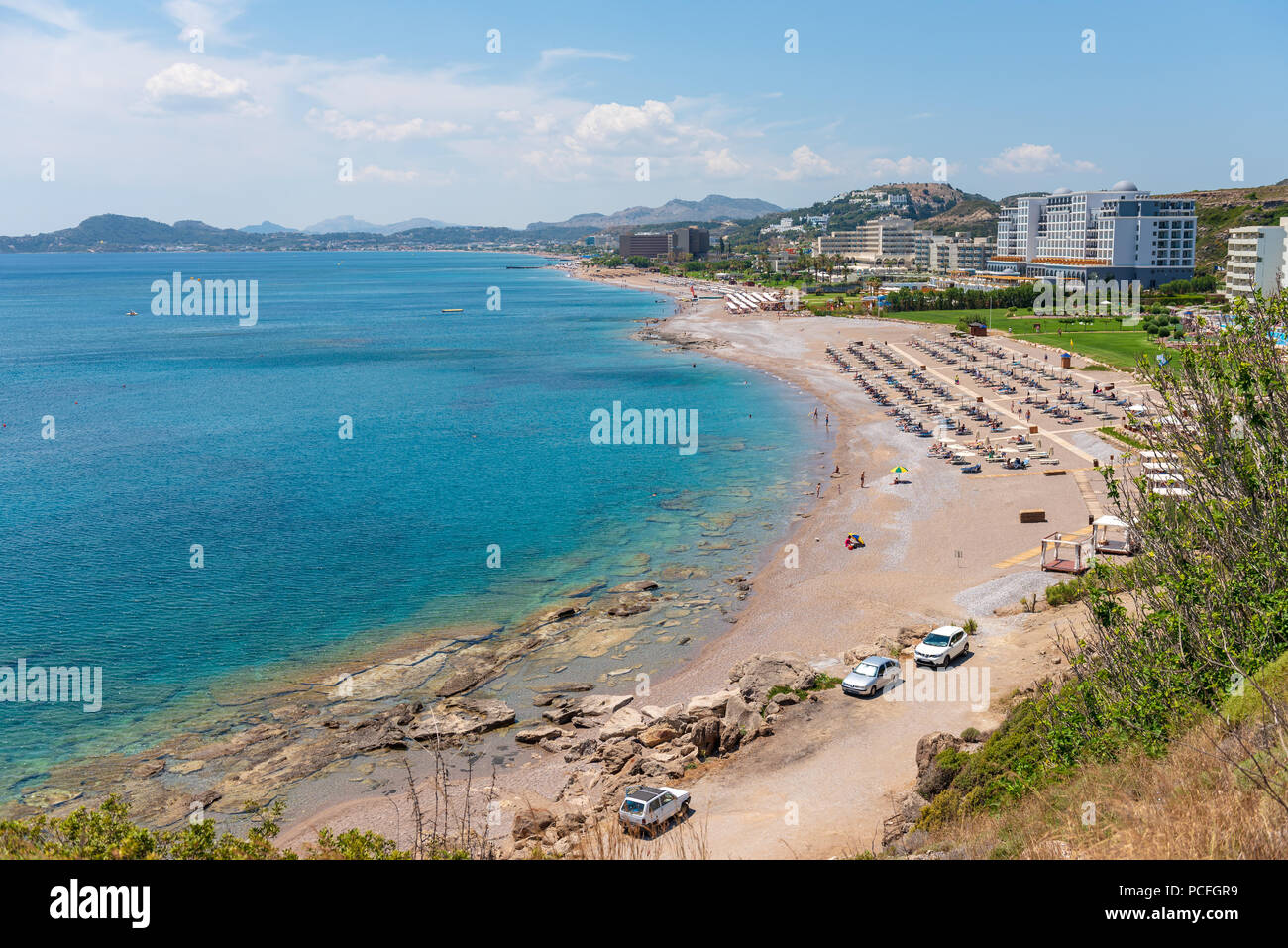 View of bay with sandy beach in Faliraki. Rhodes island, Dodecanese, Greece. Stock Photo