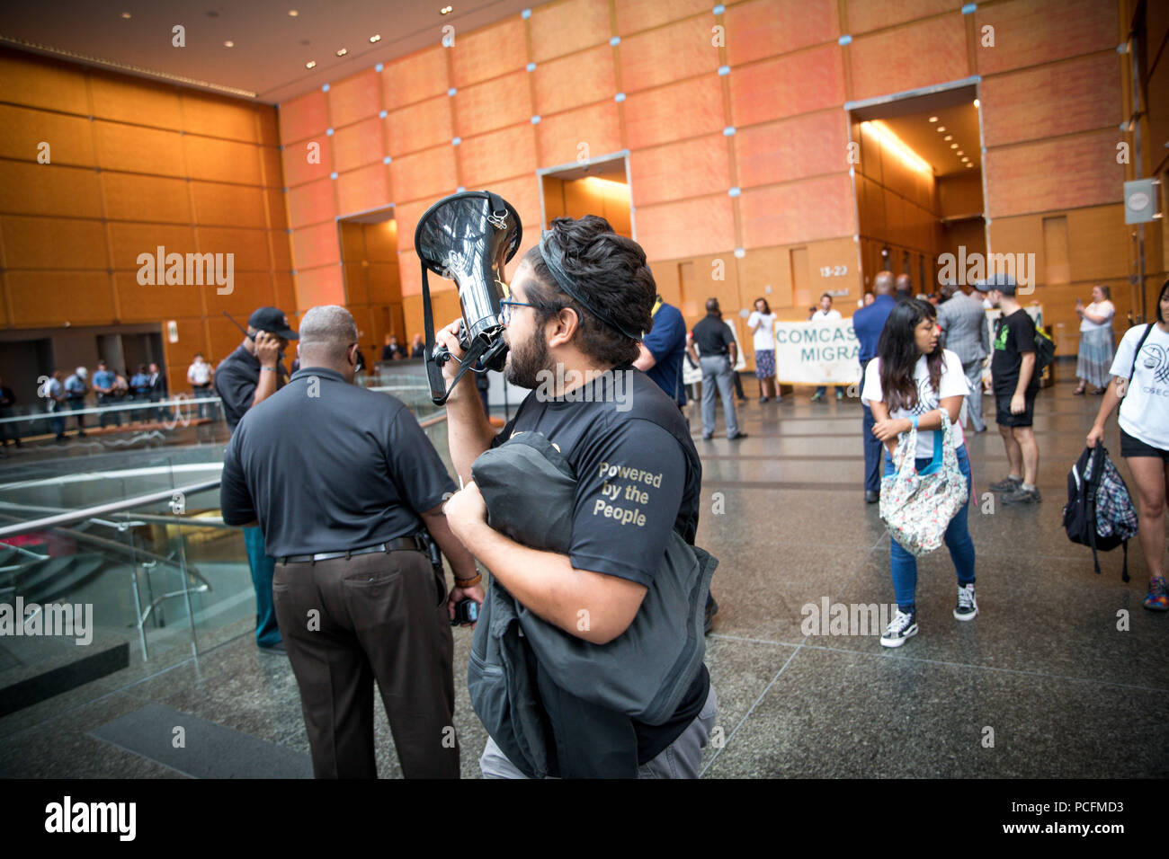 Philadelphia, USA. 31st July, 2018, Philadelphia, USA, Protesters arrested following an occupation of the Comcast building in protest of Comcast's contracts with Immigration and Customs Enforcement (ICE) Credit: Rachael Warriner/Alamy Live News Stock Photo