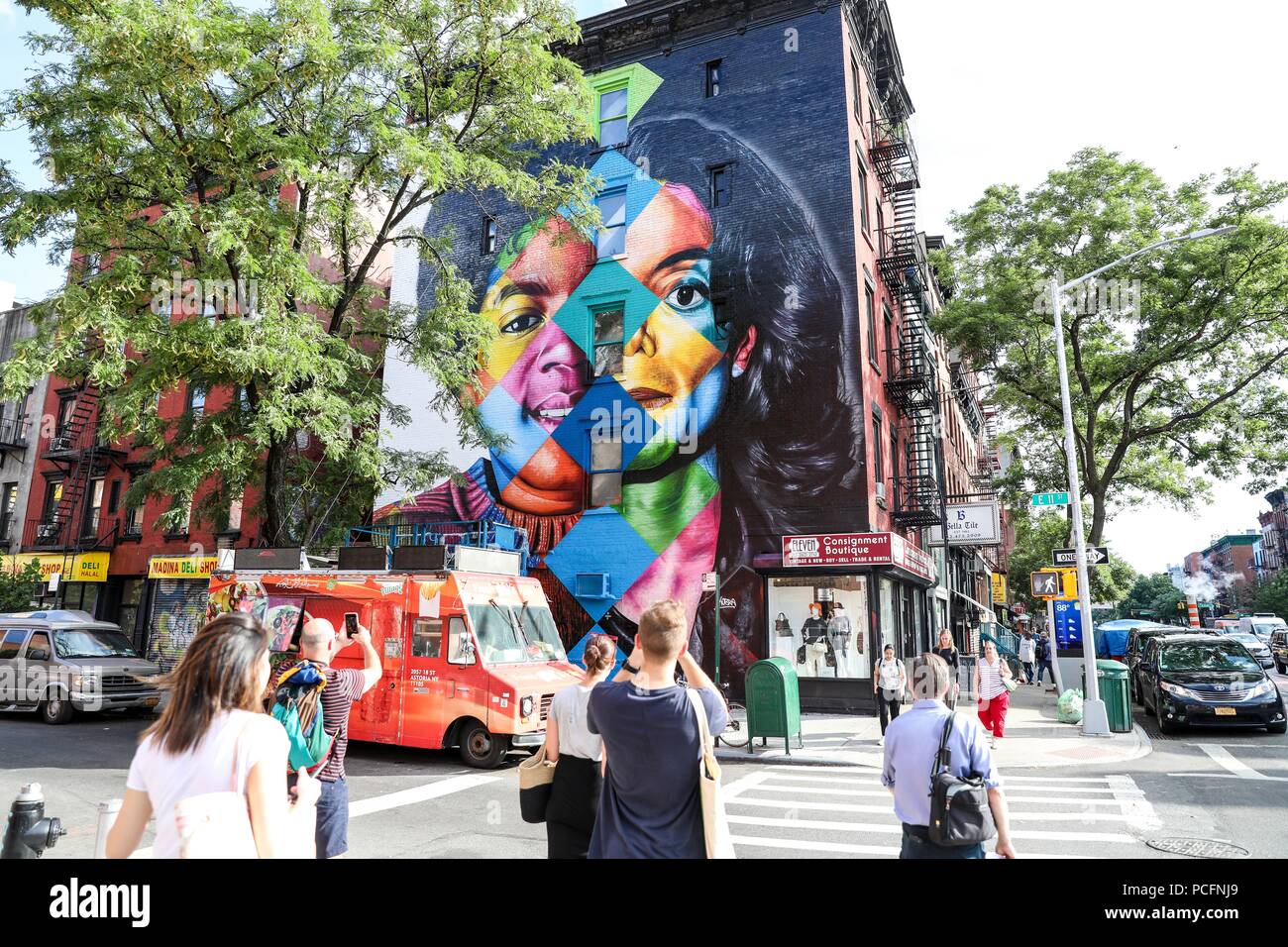 New York, USA. 1st Aug 2018. Mural joining two images of Michael Jackson, left young, and the right one of his last images that we have in mind is seen in the East Village neighborhood on Manhattan Island in the United States this Wednesday, 01. The work is being created by Brazilian muralist Eduardo Kobra, recognized around the world and will be delivered on August 25 as part of the project in celebration of Michael Jackson's 60th birthday. (PHOTO: WILLIAM VOLCOV/BRAZIL PHOTO PRESS) Credit: Brazil Photo Press/Alamy Live News Stock Photo