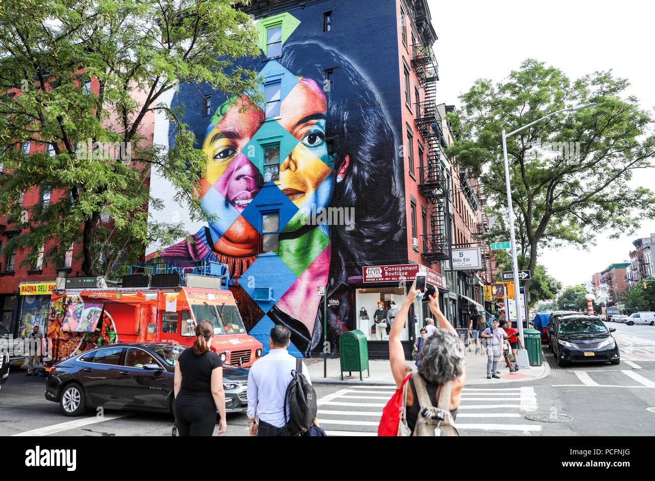 New York, USA. 1st Aug 2018. Mural joining two images of Michael Jackson, left young, and the right one of his last images that we have in mind is seen in the East Village neighborhood on Manhattan Island in the United States this Wednesday, 01. The work is being created by Brazilian muralist Eduardo Kobra, recognized around the world and will be delivered on August 25 as part of the project in celebration of Michael Jackson's 60th birthday. (PHOTO: WILLIAM VOLCOV/BRAZIL PHOTO PRESS) Credit: Brazil Photo Press/Alamy Live News Stock Photo