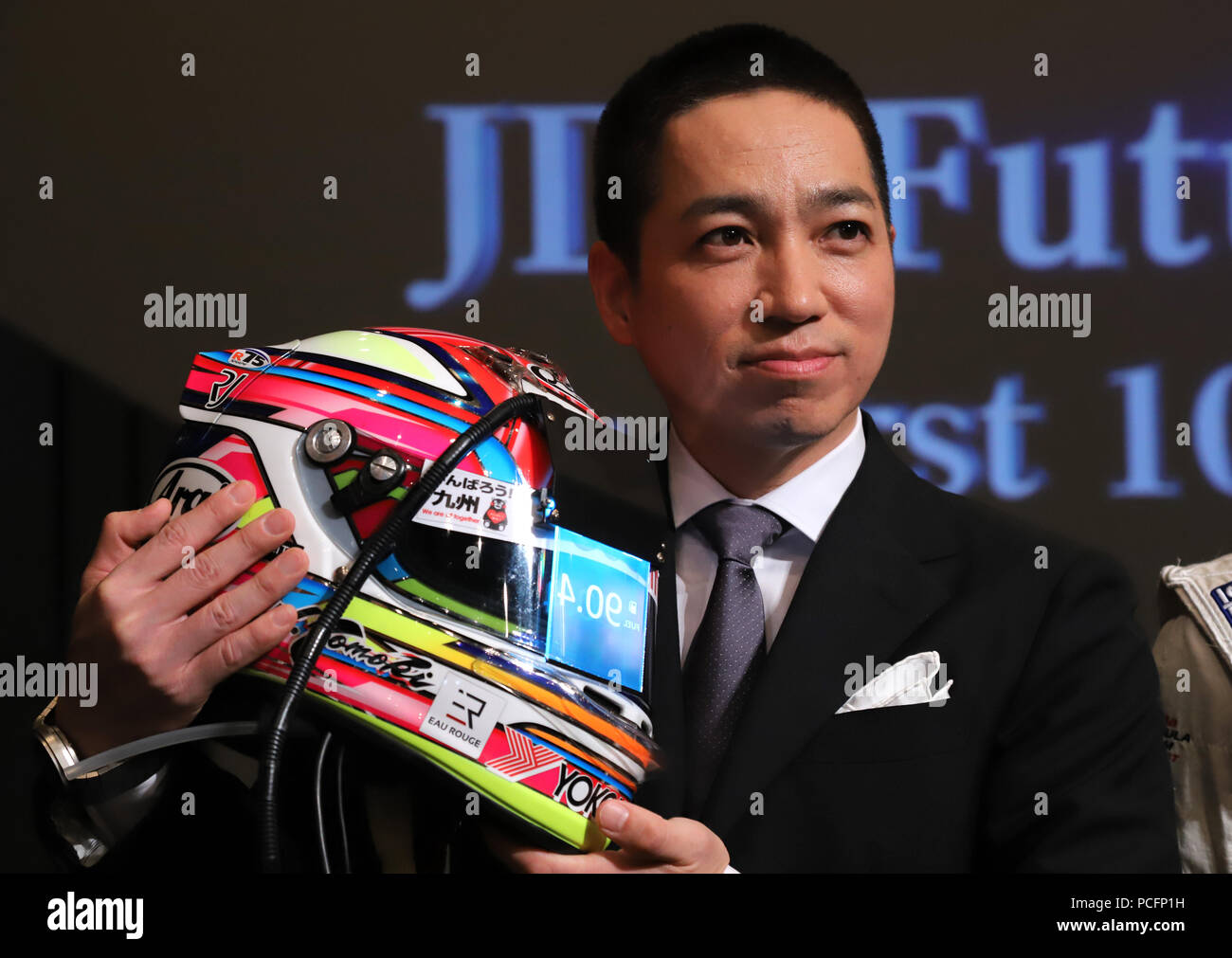 Tokyo, Japan. 1st Aug, 2018. Japan's LCD and OLED manufacturer Japan  Display Inc (JDI) chief marketing officer Yoshiaki Ito displays a  transparent color LCD display for racing helmet to show various informations