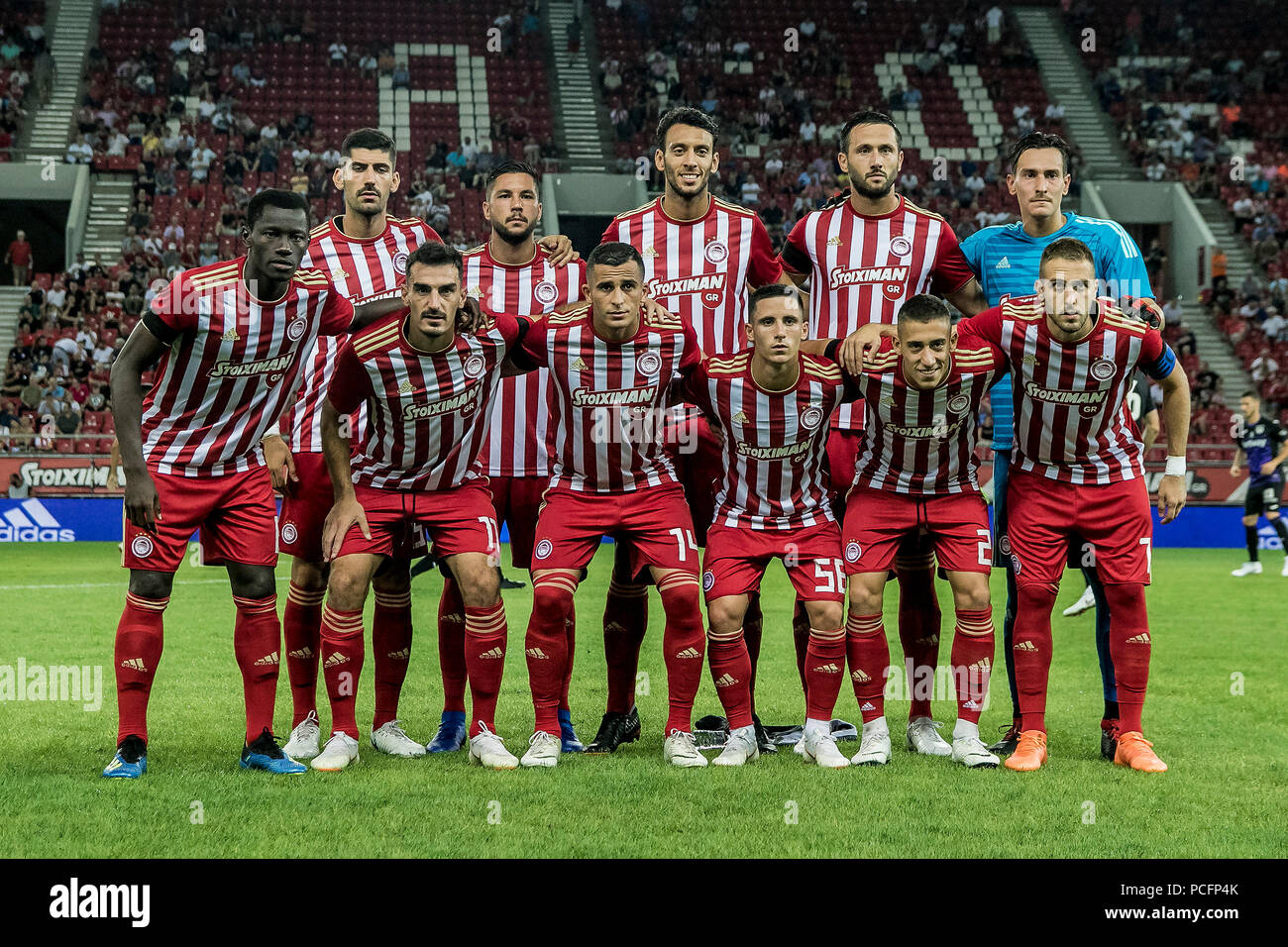 Piraeus, Greece. 1st Aug, 2018. Players of Olympiacos line up before the  friendly soccer match between