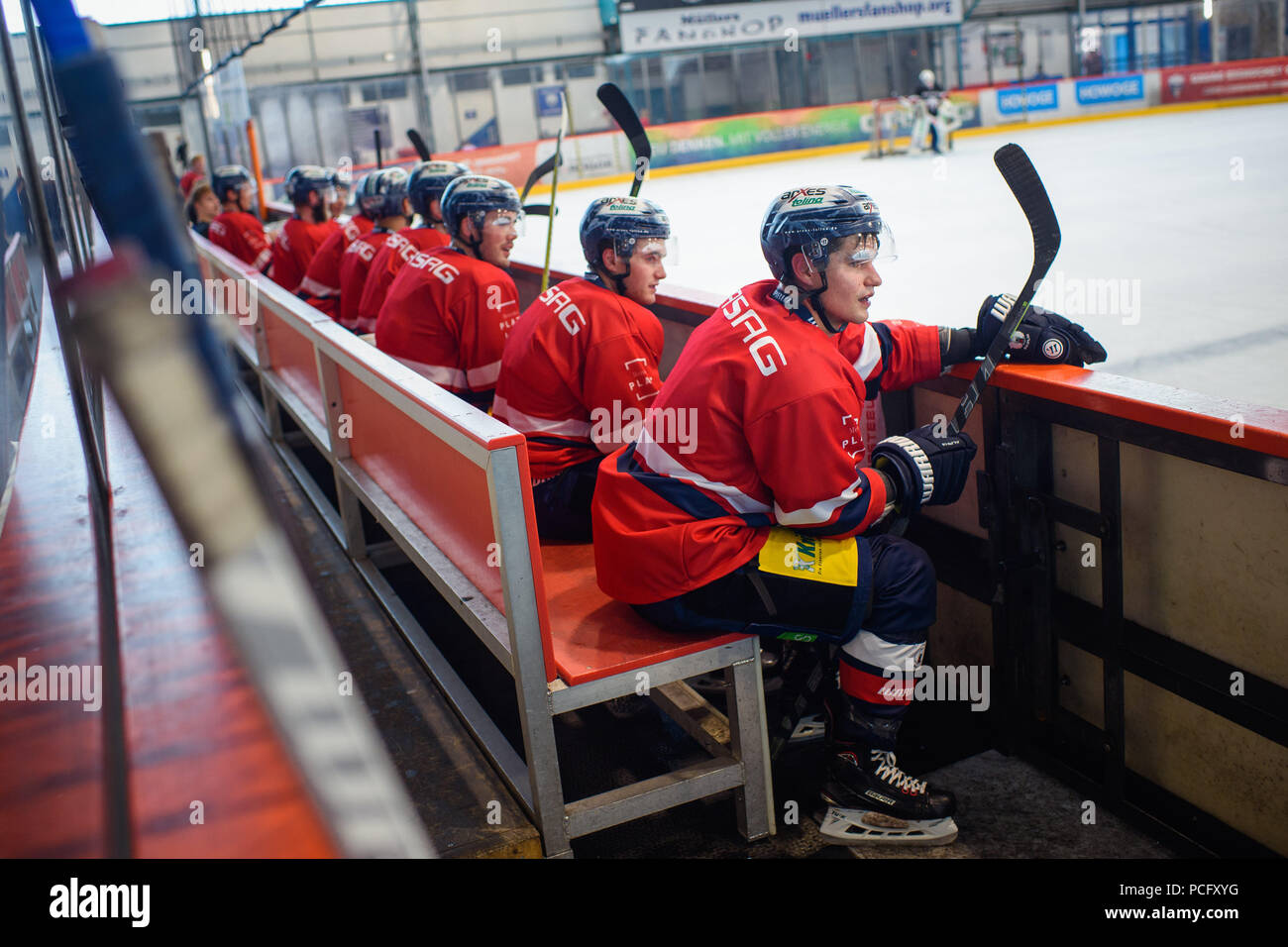 02 August 2018, Berlin, Germany: Colin Smith from the Eisbären Berlin sits together with other players on the bench at the first training session of the season at the training complex of the team, Wellblechpalast. Photo: Gregor Fischer/dpa Stock Photo