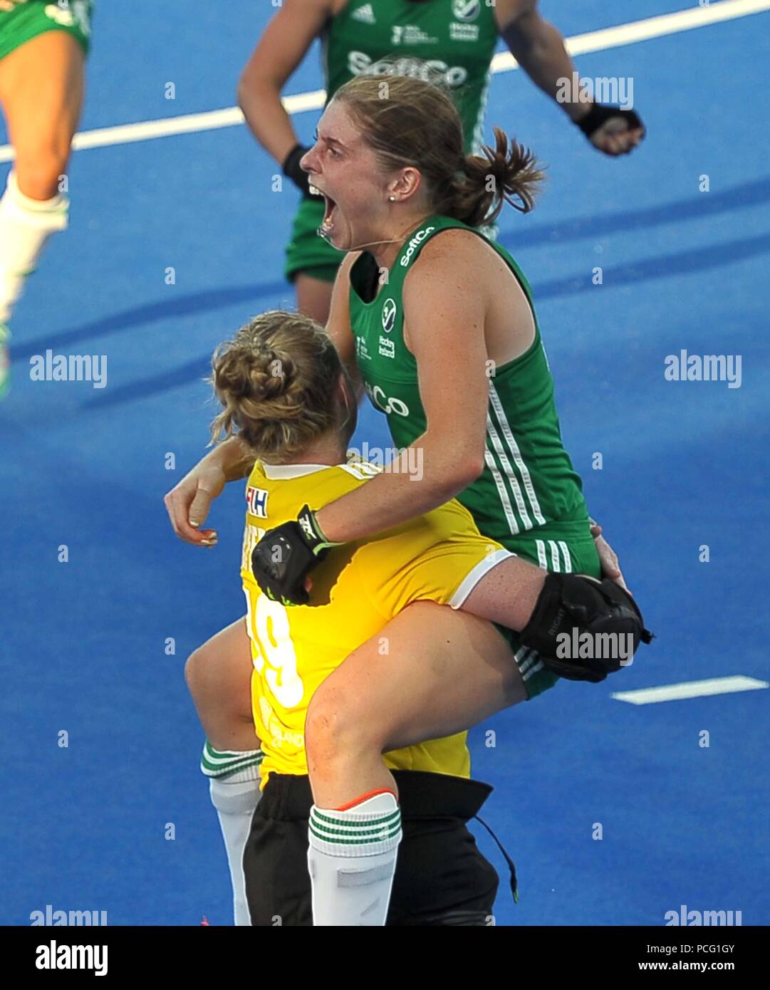 Kathryn Mullan (IRL, Captain) jumps into the arms of Ayeisha Mcferran (IRL,  Goalkeeper) to celebrate their win. Ireland V India. Match 32.  Quarterfinal. Womens Hockey World Cup 2018. Lee Valley hockey centre.