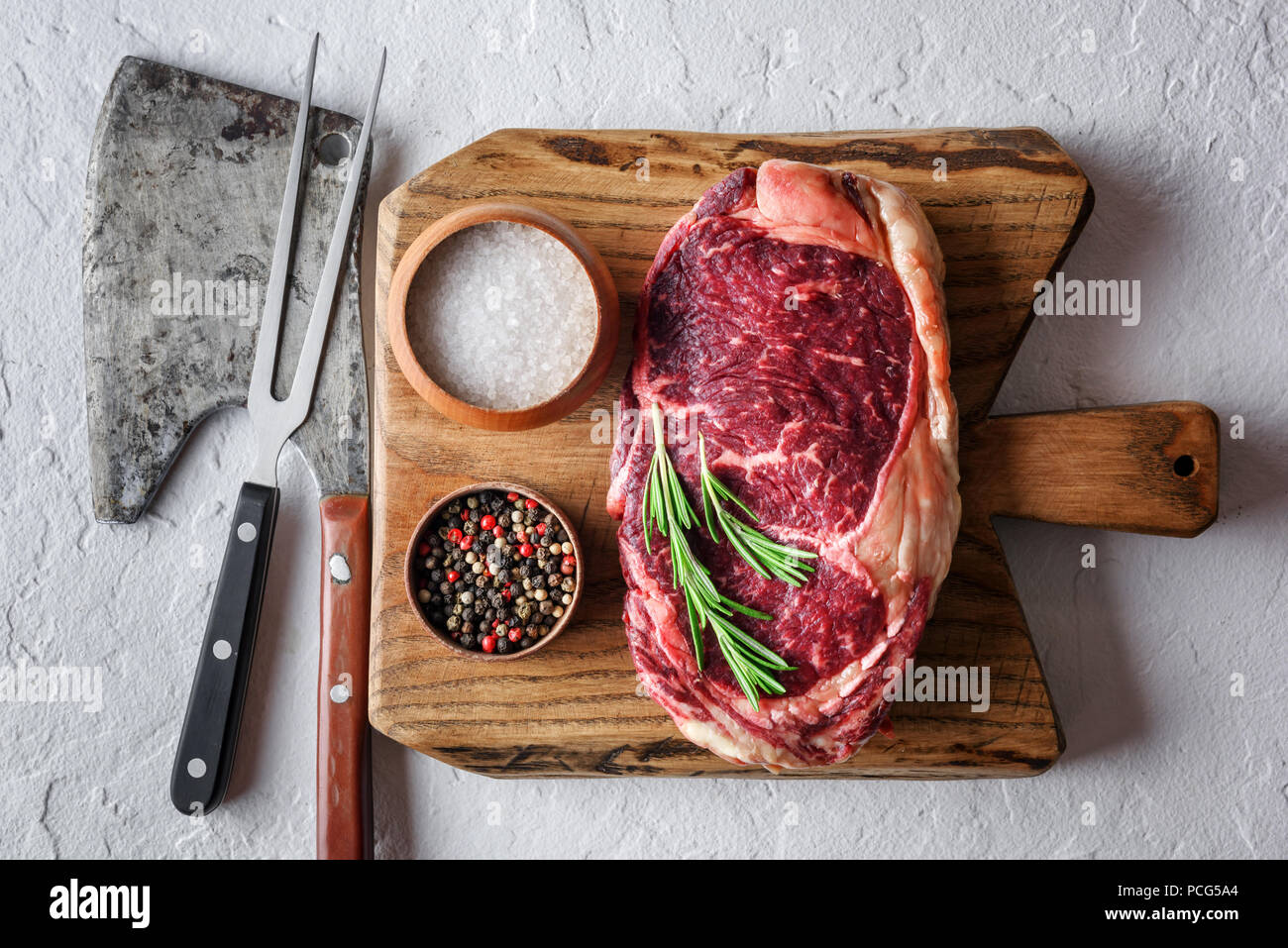 Marbling ribeye steak on wooden board Stock Photo