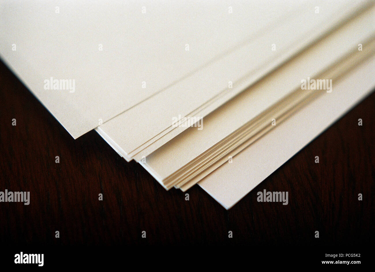 Set of paper note books on a desk (15/05/2005) Stock Photo