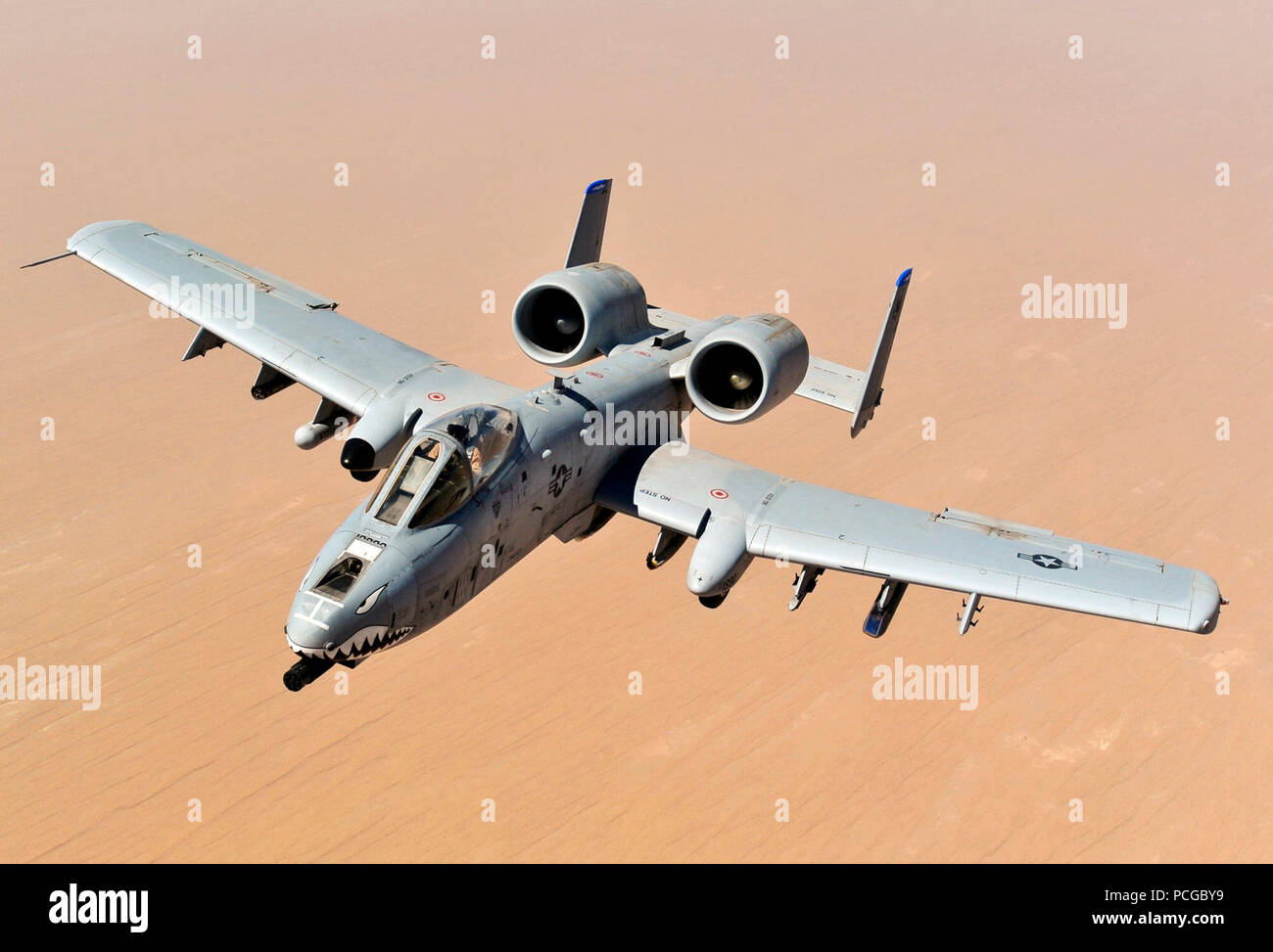 An A-10 Thunderbolt II, assigned to the 74th Fighter Squadron, Moody Air Force Base, GA, returns to mission after receiving fuel from a KC-135 Stratotanker, 340th Expeditionary Air Refueling Squadron, over the skies of Afghanistan in support of Operation Enduring Freedom, May 8, 2011. Stock Photo