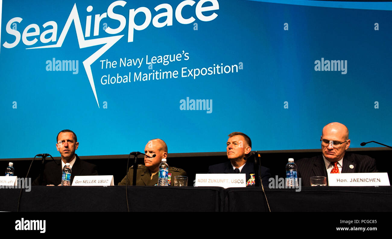 NATIONAL HARBOR, Md. (May 16, 2016) Chief of Naval Operations Adm. John Richardson, left, Commandant of the U.S. Marine Corps Gen. Robert Neller, Commandant of the U.S. Coast Guard Adm. Paul K. Zukunft, and  Paul N. Jaenichen, administrator of the U.S. Maritime Administration, speak during their “Service Chief’s Update” panel discussion at the Sea-Air-Space Exposition. The annual event brings together key military decision makers, the U.S. defense industrial base and private-sector U.S. companies for an innovative and educational maritime based event. Stock Photo