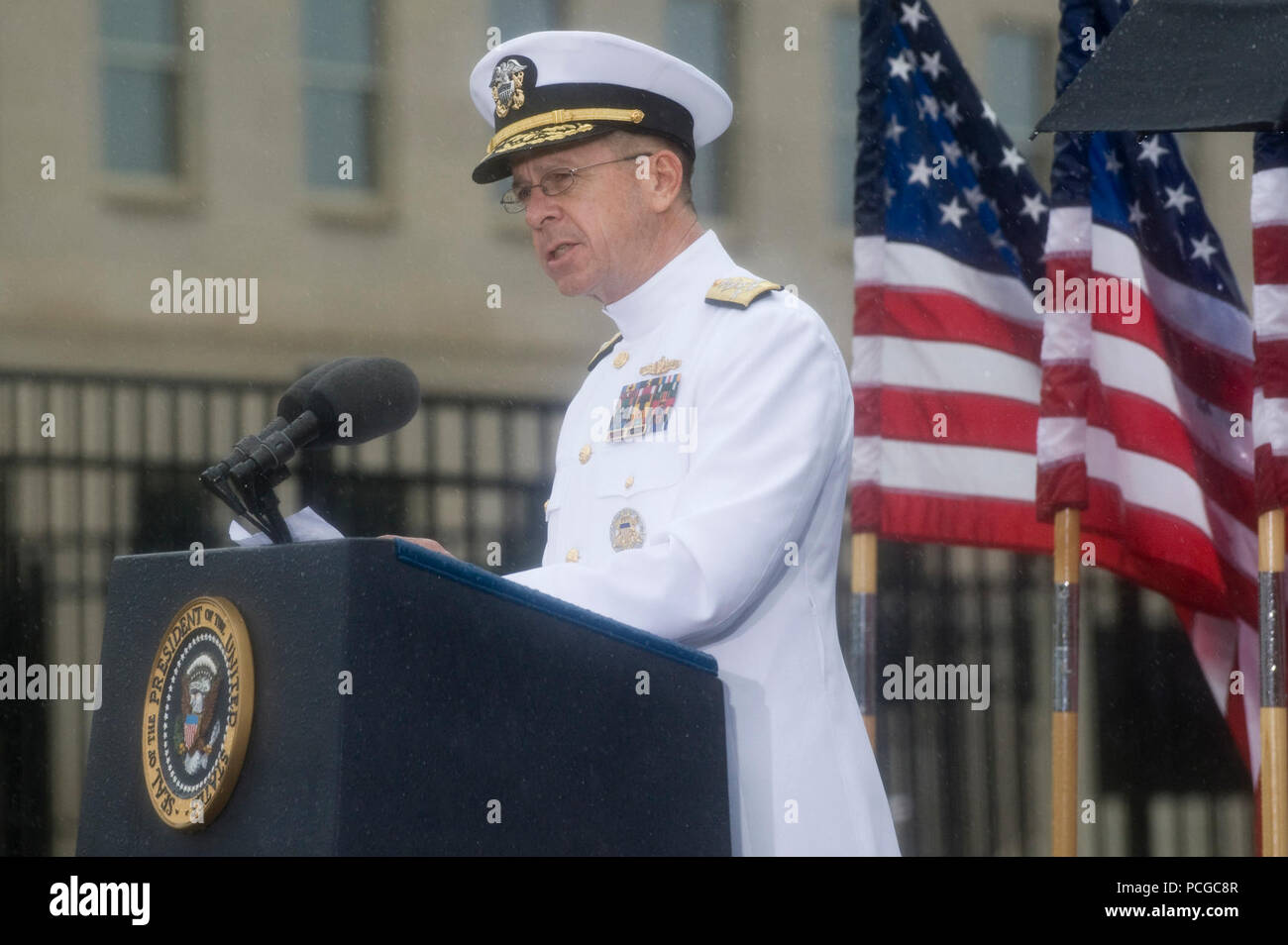 Chairman of the Joint Chiefs of Staff Navy Adm. Mike Mullen speaks during a remembrance event at the Pentagon Memorial Sept. 11, 2009. The event included a wreath-laying and was held to honor the memory of those killed in the 2001 terrorist attack. ( Stock Photo
