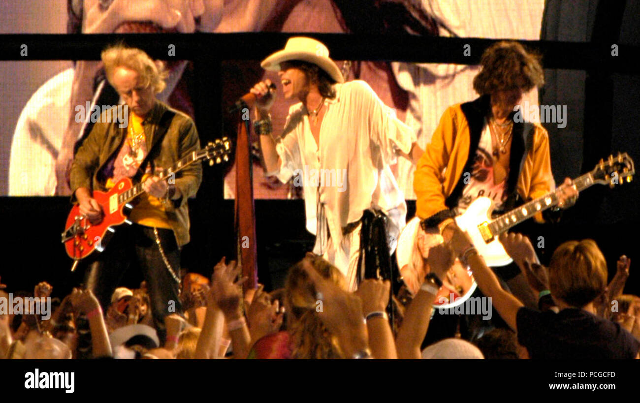 D.C. (Sept. 4, 2003) -- Aerosmith performs on stage during the Operation Tribute to Freedom, NFL and Pepsi sponsored ТNFL Kickoff Live 2003У Concert on the Mall.  Organizers provided priority seating for military members and their families. Among the other performers were Britney Spears, Aretha Franklin, Mary J. Blige and Good Charlotte. Operation Tribute to Freedom (OTF) was set up by the Department of Defense as a way for Americans to show their appreciation to our men and women in uniform.   U.S. Navy Stock Photo