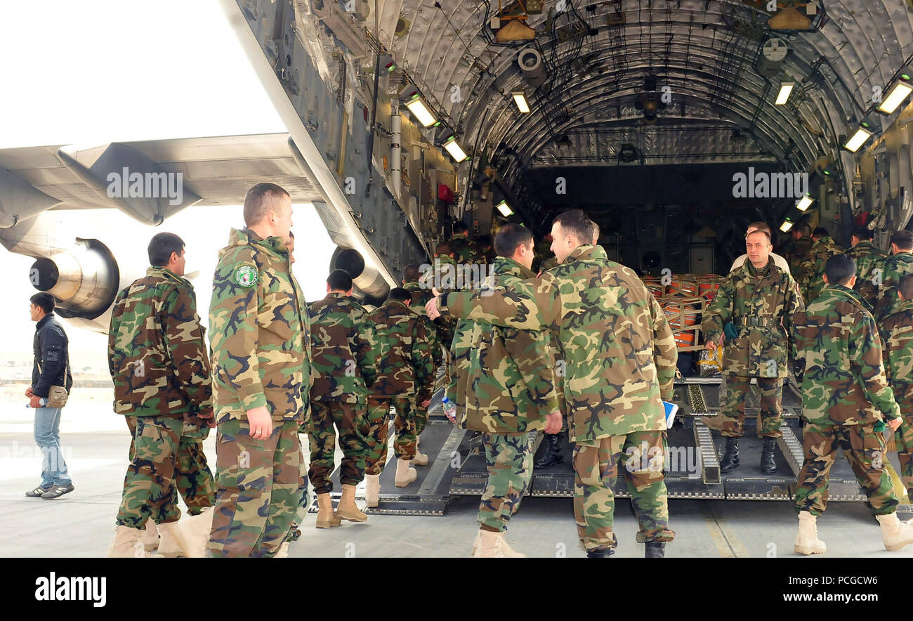 Afghan National Army soldiers board their C-17 cargo plane as it finishes fueling for their flight to Turkey on March 5 at the International Security Assistance Force airport in Kabul. The soldiers will be flying to turkey to receive training in leadership and the military skills required to operate as a special operations unit. Stock Photo