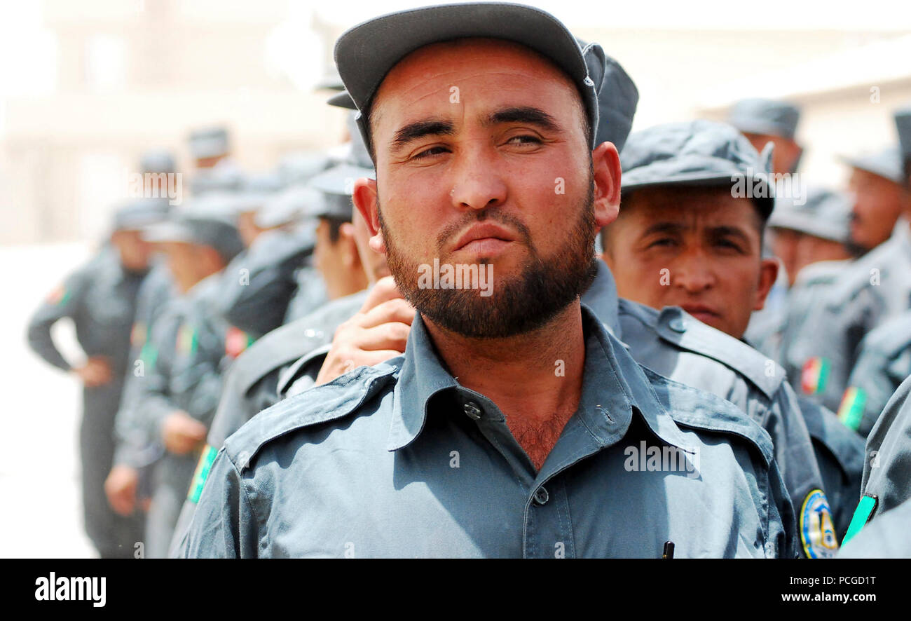 Afghanistan (July 19, 2010) –Afghan National Police (ANP) recruits queue up for chow at Recruit Training Center-Kandahar (RTC-K). Since its inception in 2004, RTC-K has trained more than 17,747 Afghan volunteers to join the ranks of the ANP. U.S. Navy Stock Photo