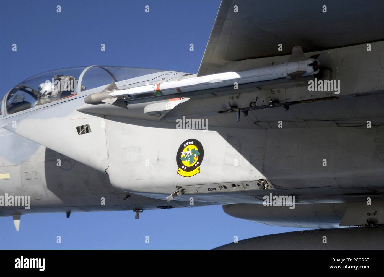 A close up view showing an AIM-9X Sidewinder short-range, heat-seeking air intercept missile attached to the port side inboard wing pylon of a US Air Force (USAF) F-15C Eagle aircraft assigned to Detachment 1, 28th Test Squadron, Nellis Air Force Base (AFB), Nevada (NV), during an evaluation flight conducted over the Gulf of Mexico by the Air Force Operational Test and Evaluation Center, Detachment 2, located at Eglin AFB, Florida (FL). Stock Photo