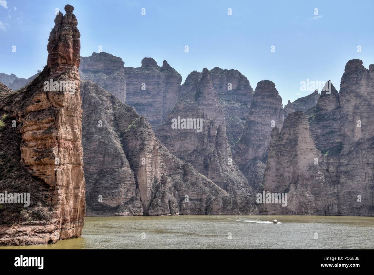 Liujiaxia Dam the picturesque place near the Bingling Cave with great rock formations along the Yellow River. Stock Photo