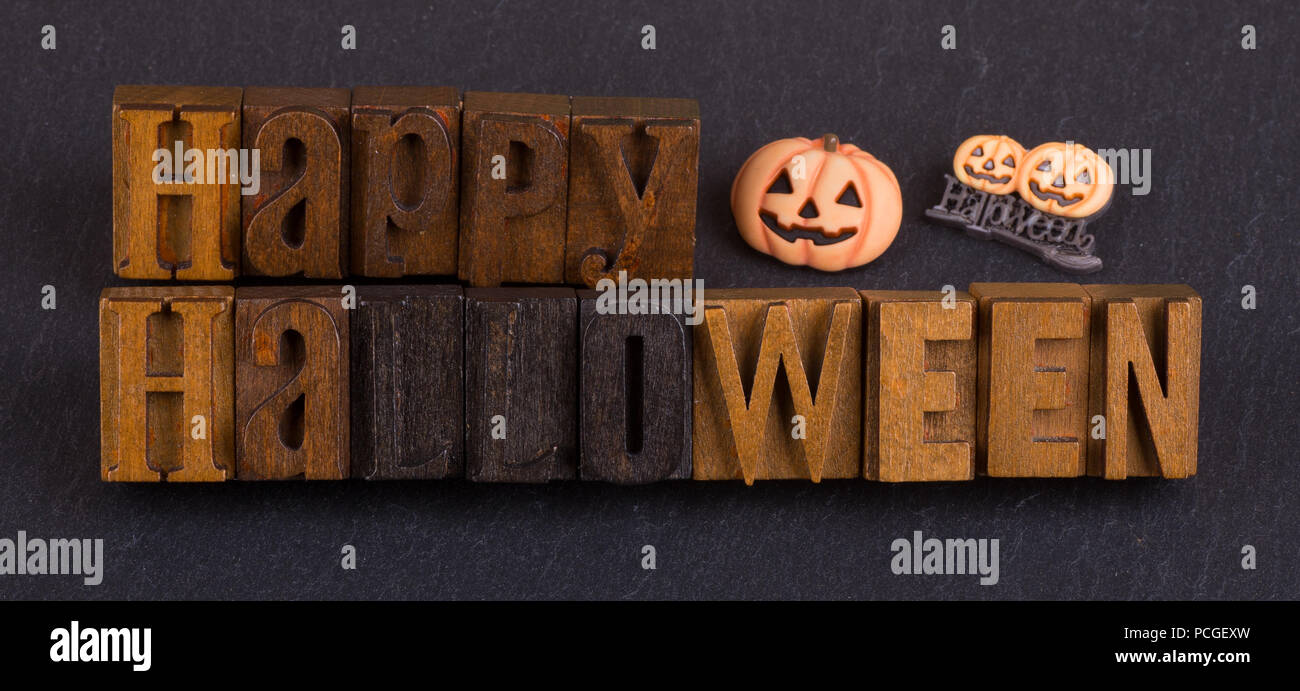 Happy halloween sign on a black background Stock Photo