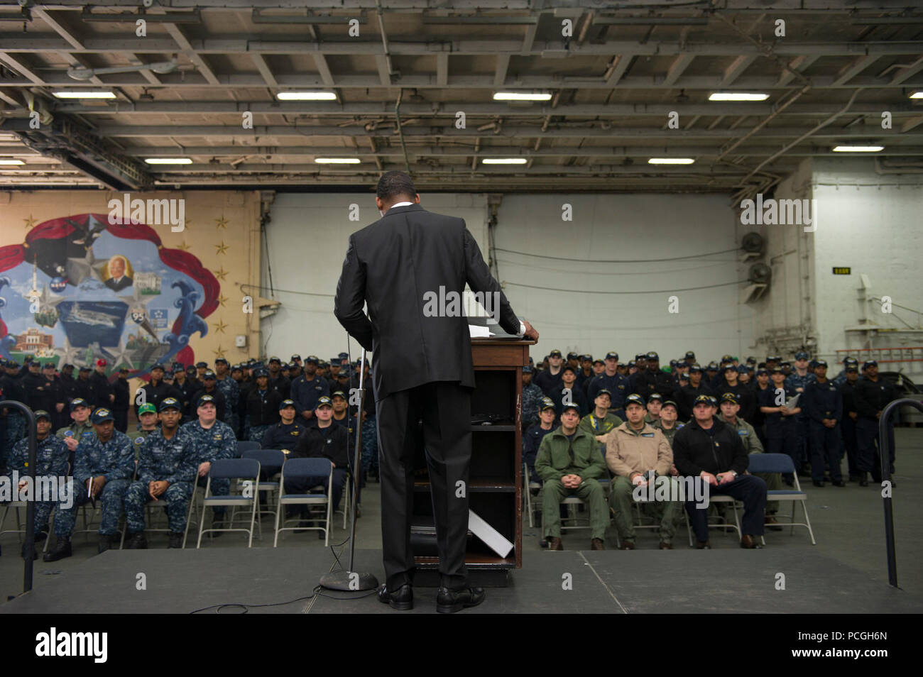 NORFOLK (Feb. 29, 2016) Aviation Boatswain's Mate (Equipment) Airman Malik Robinson recites Martin Luther King Jr.'s 'I Have a Dream' speech during an African-American Heritage Month observance in the hangar bay of the aircraft carrier USS Dwight D. Eisenhower (CVN 69). Dwight D. Eisenhower is preparing to get underway to conduct a Mobile Training Team (MTT) inspection. Stock Photo