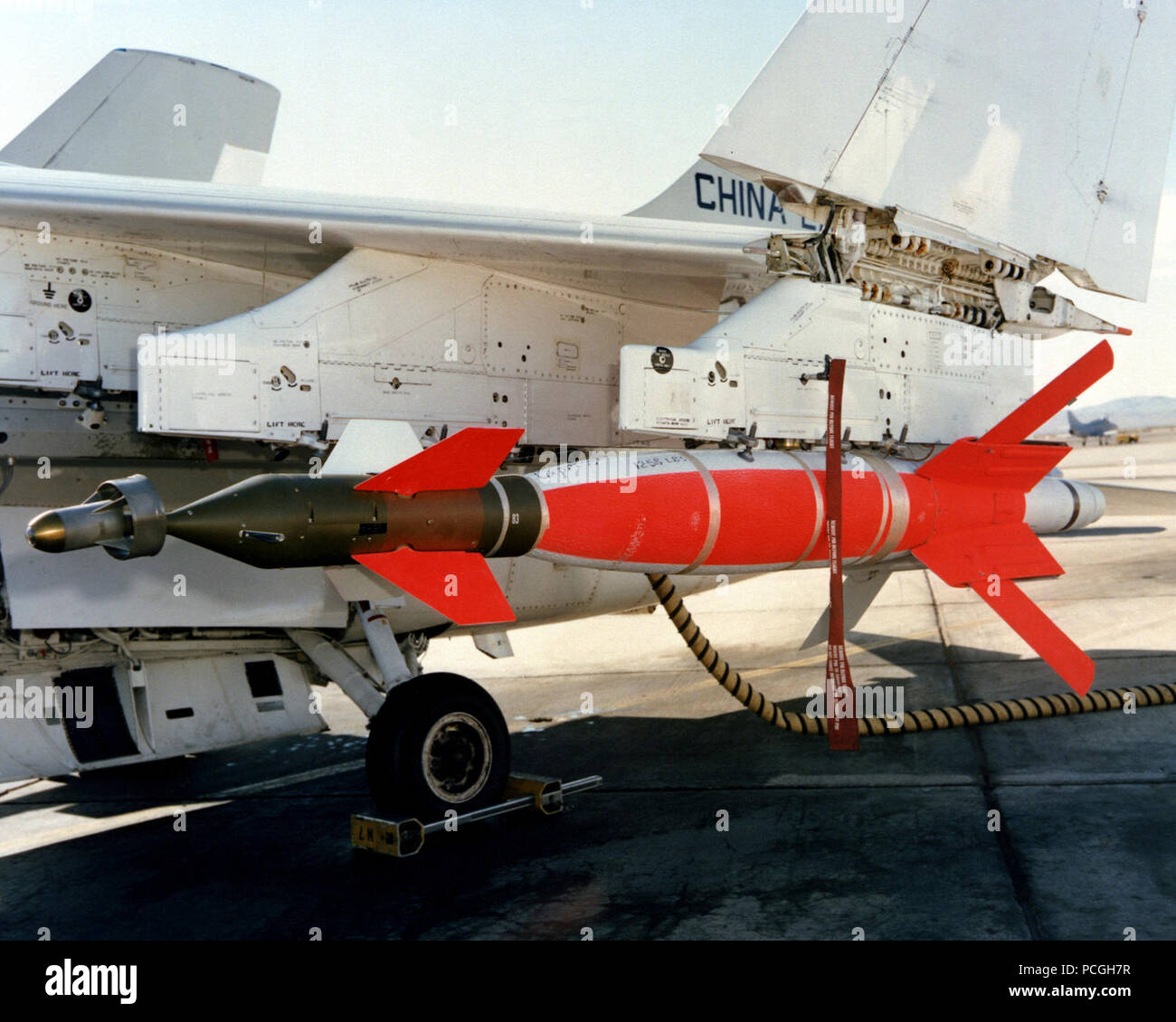A left front view of an AGM-123A Skipper II low-level laser-guided bomb mounted on the wing pylon of an A-7 Corsair aircraft. Stock Photo