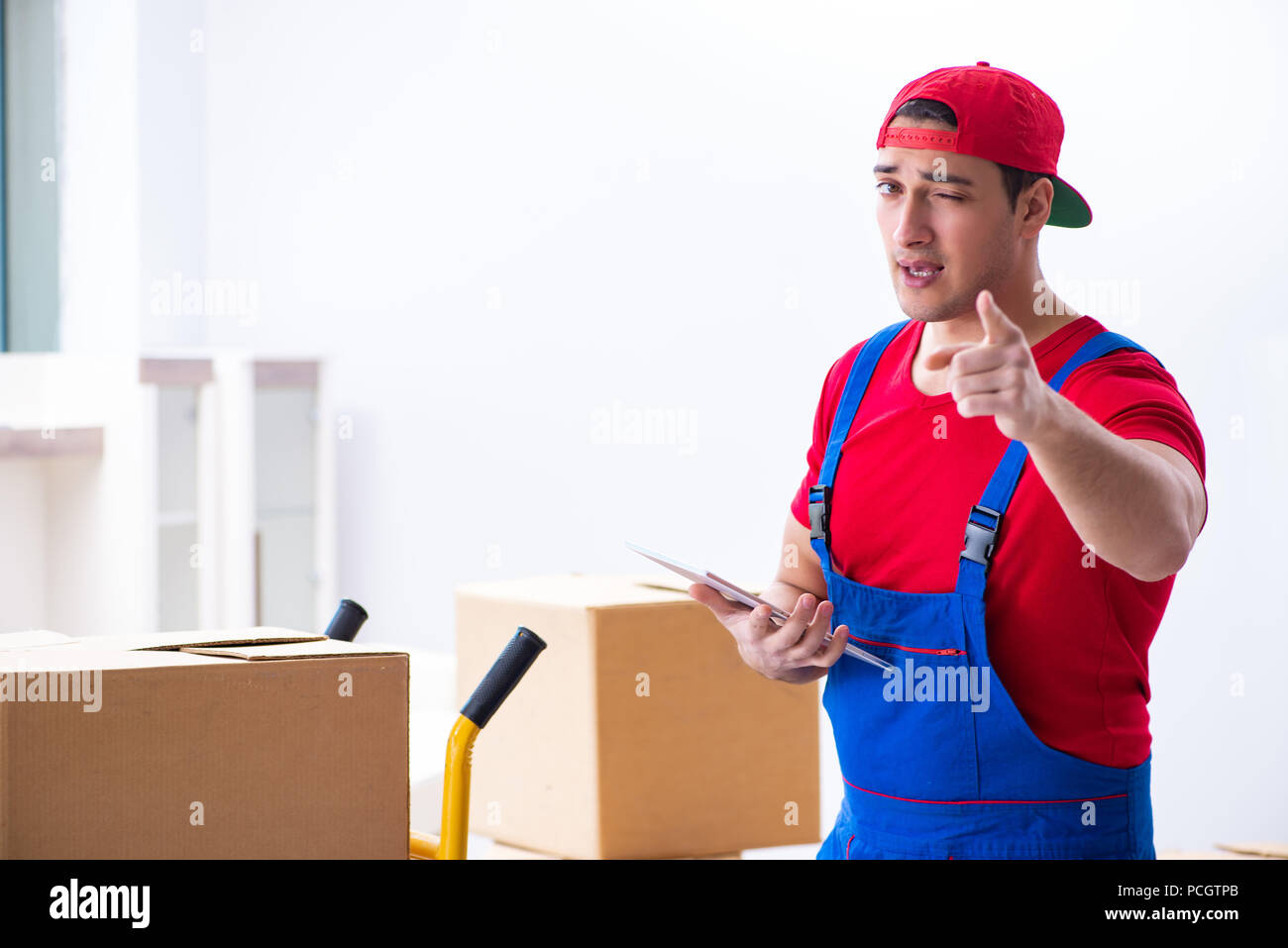 Contractor worker moving boxes during office move Stock Photo