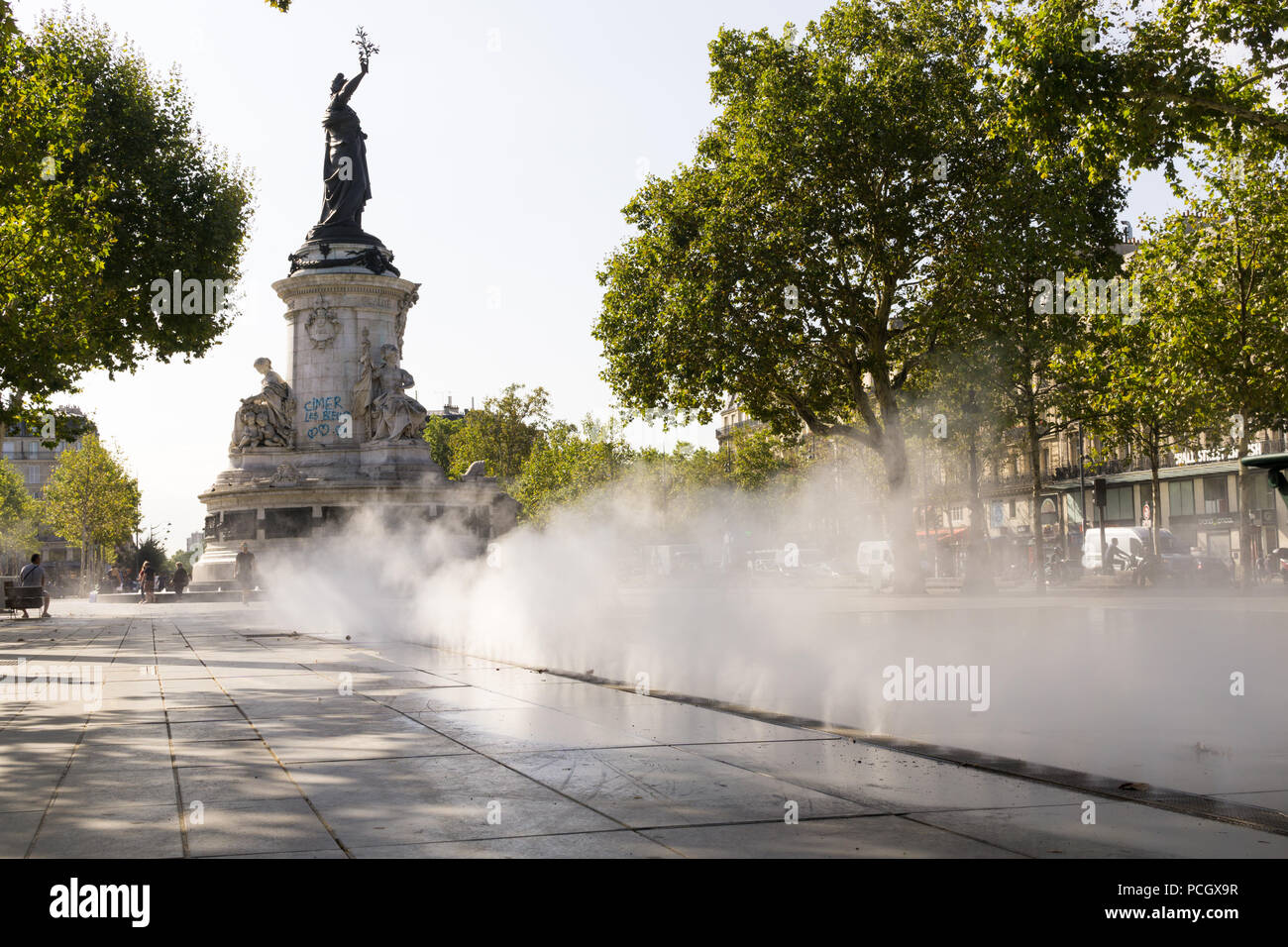 Paris Place de la Republique - Water vapour released from a fountain on Place de la Republique in Paris, France, Europe. Stock Photo