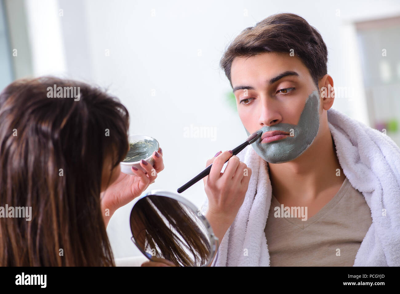 Man peeling off mask hi-res stock photography and images - Alamy