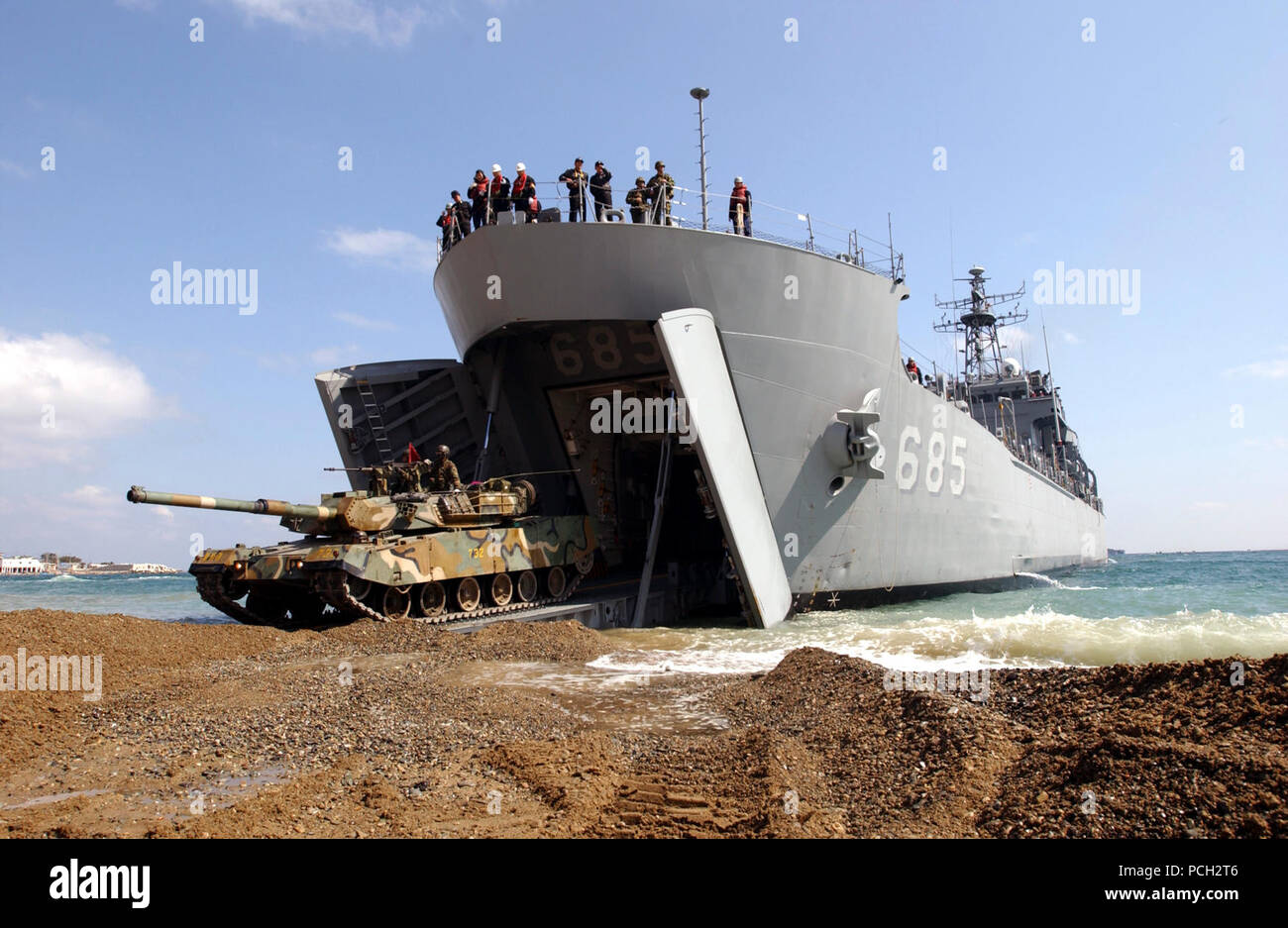 Pohang Beach, Korea (Mar. 26, 2004) - A Republic of Korea Type 88 K1 Main Battle Tank drives off the Korean Amphibious Ship Sungoonbang (LST 685) onto Pohang Beach, Korea, throughout a simulated amphibious attack on Pohang Beach, Korea, during Reception, Staging, Onward Movement, and Integration, and Foal Eagle 2004. The exercise is an annual U.S. and South Korea exercise tailored to evaluate command capabilities to receive U.S. Forces from outside Korea while teaching, coaching, and mentoring exercise participants. U.S. Air Force Stock Photo